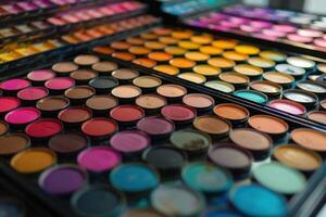Vibrant assortment of makeup palettes displayed at a beauty supply store, showcasing a variety of colors and shades photo