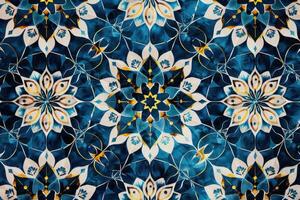 Decorative pattern featuring intricate floral designs in blue and gold tones set against a dark background photo