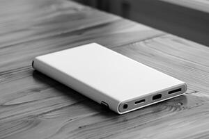 A sleek white phone case resting on a wooden surface in a modern setting photo