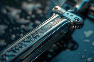 Close-up of a beautifully crafted balisong knife resting on a wet surface with intricate patterns reflecting light photo