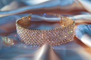 Elegant sparkling tiara resting on satin fabric under soft lighting photo