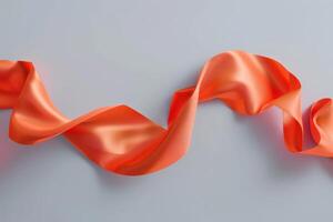 A bright orange satin ribbon elegantly draped on a light blue surface, showcasing its smooth texture and vibrant color photo