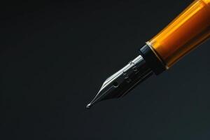 Close-up of a fountain pen with a metallic nib on a dark background photo