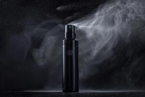 Black spray bottle releasing mist against a dark background photo