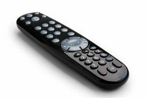 A sleek black remote control on a white background during daylight photo