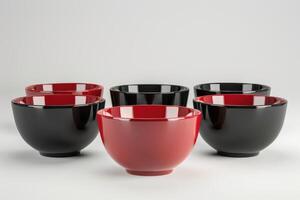 Elegant modern bowls in black and red arranged artfully for stylish table setting ideas photo