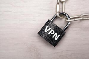 padlock with network VPN with a steel chain closeup top view photo