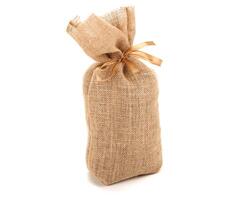 big bag of bow tied with a bow on a white background isolated photo