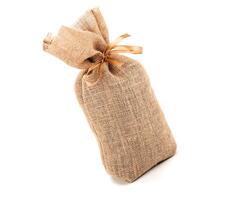 big bag of bow tied with a bow on a white background isolated photo