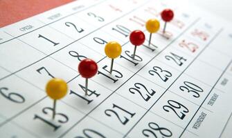 wall calendar with number of days needles in a row photo