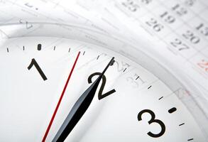 wall calendar with the number of days and clock photo