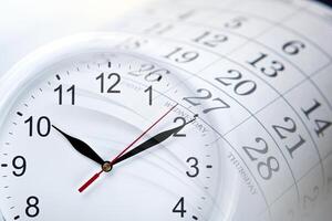 wall calendar with the number of days and clock photo