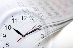 wall calendar with the number of days and clock photo