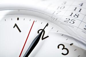 wall calendar with the number of days and clock photo