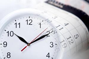 wall calendar with the number of days and clock photo