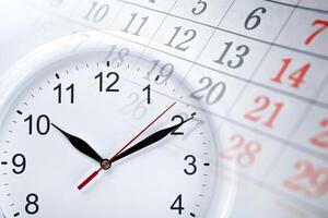 wall calendar with the number of days and clock photo