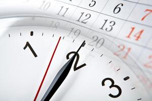 wall calendar with the number of days and clock photo