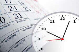 wall calendar with the number of days and clock photo