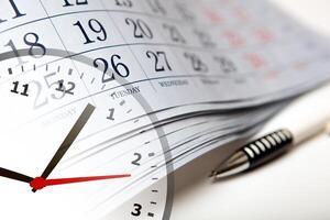 wall calendar with the number of days and clock photo