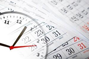 wall calendar with the number of days and clock photo