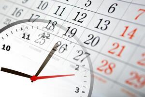 wall calendar with the number of days and clock photo