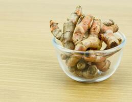 Turmeric root for alternative medicine ,spa products and food ingredient. photo