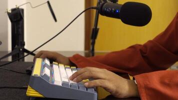 A person is using a keyboard video