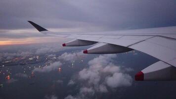 A view of the wing of an airplane from the window video