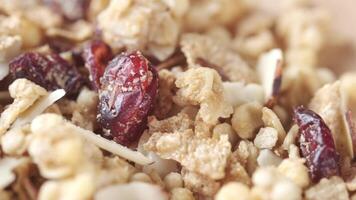 A close up of granola with almonds and cranberries video