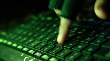 A person is typing on a computer keyboard video