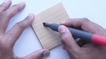 high angle view of question mark on paper on office desk video
