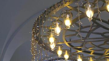 An Elegant Chandelier Featuring Warm Lighting in a Luxuriously Sophisticated Setting video
