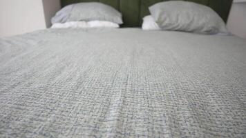 A Cozy Bed, Adorned with Soft Textured Bedding and Plush Pillows for Ultimate Comfort video