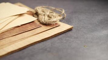 Explore beautiful rustic craft supplies that include twine and natural papers for your projects video