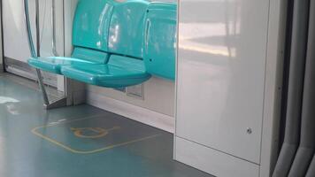 The seating area in a modern train comes equipped with essential accessibility features for all video