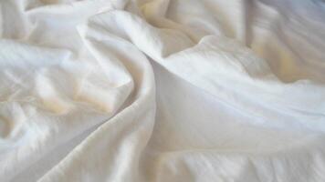 The Soft White Fabric Texture Features Gentle Creases That Add Depth and Character video