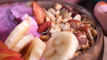 Indulge in a nutritious Smoothie Bowl with a variety of fresh fruits and nuts for a healthful boost video