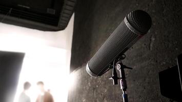 Boom Microphone on stand in Production which recording audio and ambient sound in studio. photo