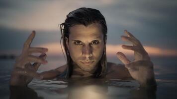 A Mystical Man Emerging from Serene Waters During Dusk Hours video