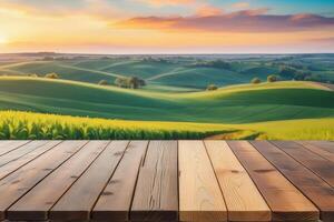 The empty wooden table top with blur background of tea plantation. Exuberant image. photo