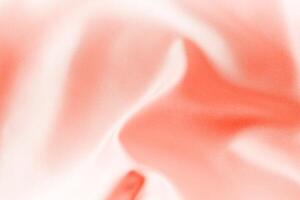 red silk fabric texture. Satin background photo