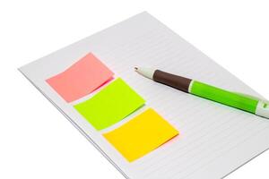 isolated on white background. Open notepad with sticky notes mockup and pan. photo