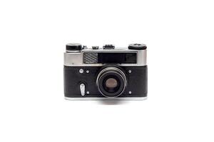 Soviet old camera with leather elements on the body with the lens. Isolate photo