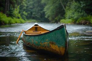 Serene River Adventure with Rustic Canoe in Tranquil Forest Setting - Perfect for Nature Trips and Outdoor Exploration photo