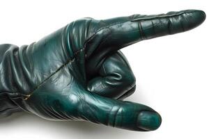 Close-Up of Green Leather Gloved Hand Pointing Right for Guidance and Direction Concept photo