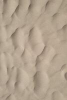 Abstract Aerial View of Sand Dunes - Natural Desert Patterns for Texture Design and Background Use photo