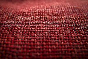 Close-Up of Red Textured Fabric Weave Pattern - Perfect for Textile Design, Backgrounds, and Art Projects photo