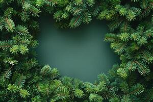 Natural Evergreen Fir Branches Forming a Heart-Shaped Frame for Holiday Designs and Nature Themes photo