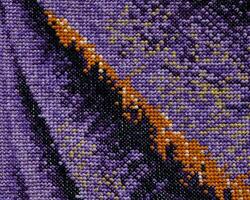 Purple, violet and brown close-up cross stitch background. Abstract Embroidered handmade Pattern. Needlework and DIY concept. Top view, macro, flat lay, mockup. photo