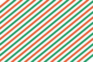 Festive Christmas pattern with diagonal green and red stripes on a white background. Candy cane repeating decoration wallpaper. Xmas peppermint present wrapping print design. vector